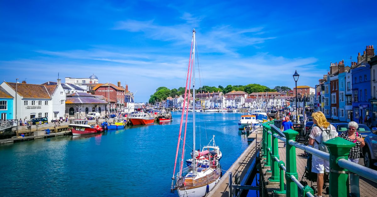Weymouth, Dorset / England - July 8, 2019: A beautiful harbour in the summer holidays town of Weymouth, in Dorset, England